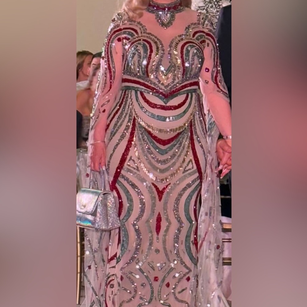 Unique custom made gown gold and silver and multiple color all hand beaded.